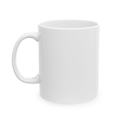 White 11oz ceramic mug with handle on the left, blank side view on a plain white background